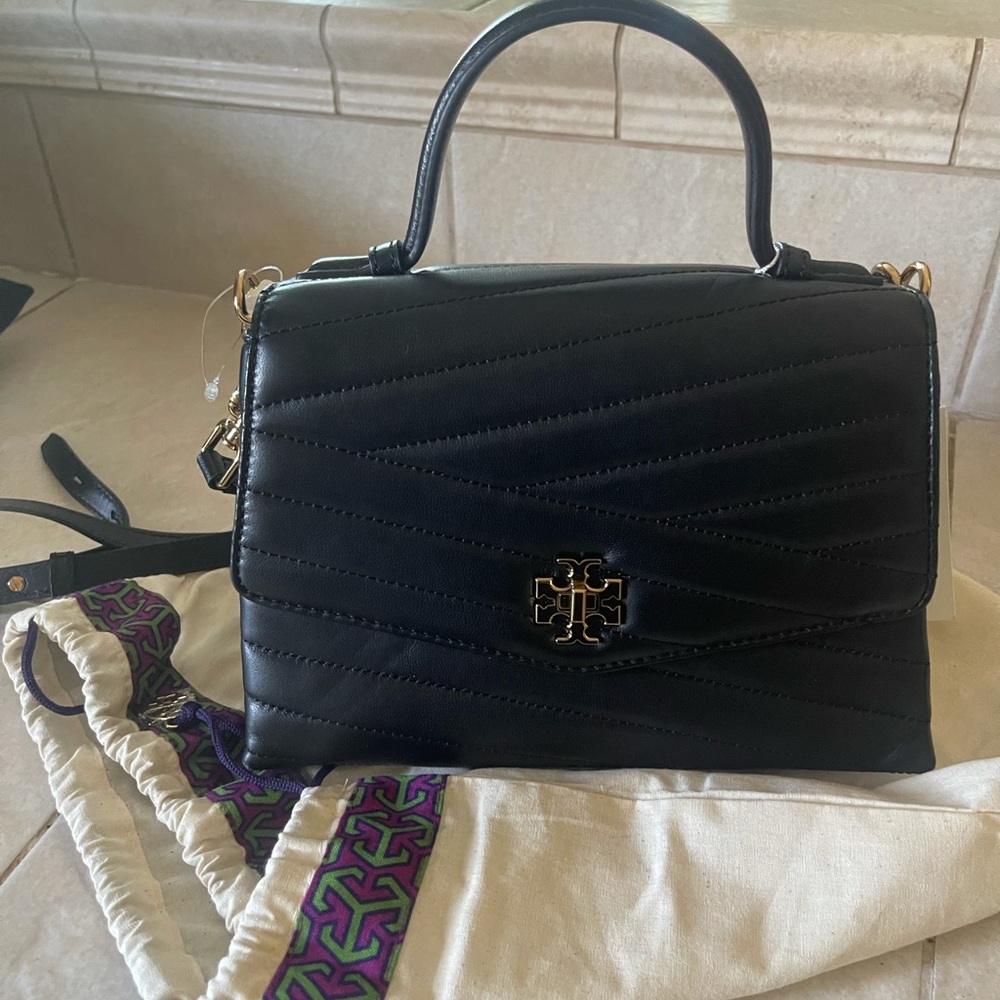 Never used . Brand new Tory Burch black crossbody.